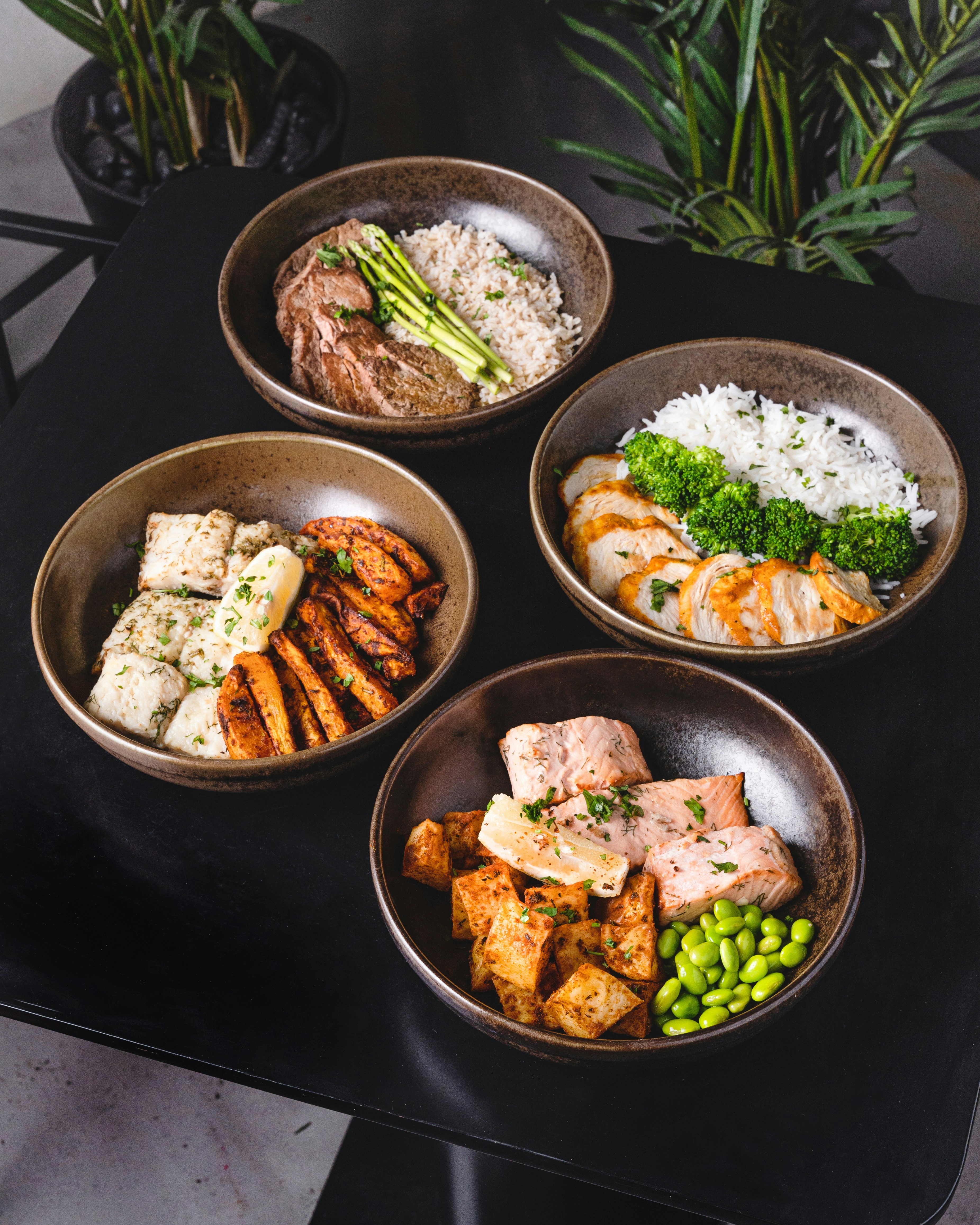 Healthy meal prep bowls with protein and vegetables